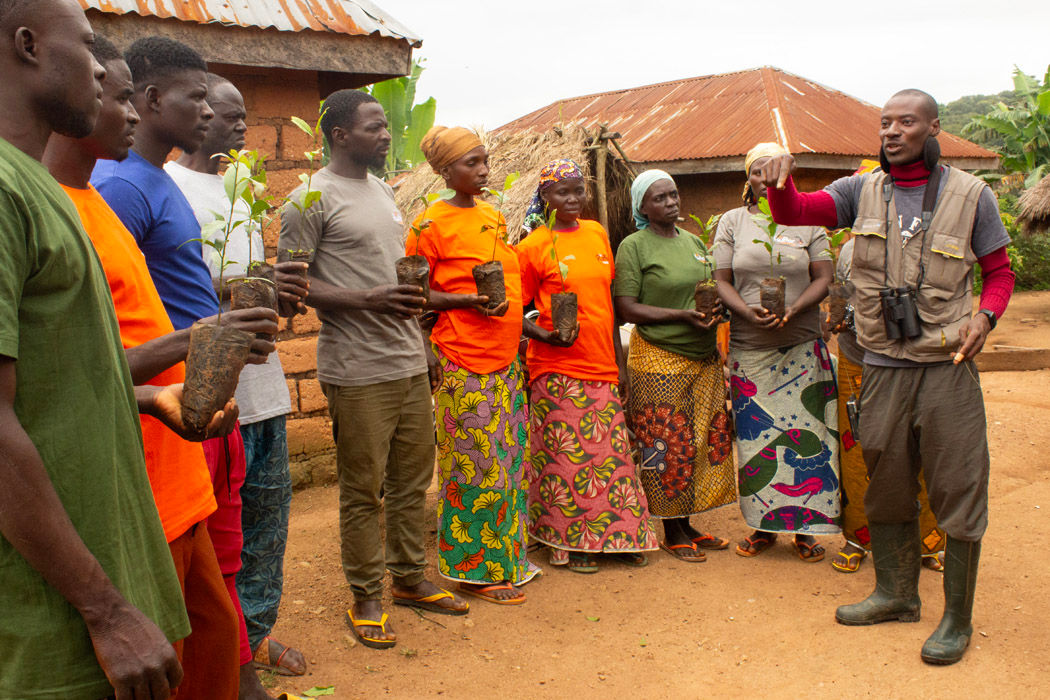 Villagers with donated trees