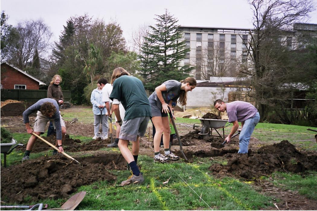 Students upturn the lawn to create the new UC Community Garden 20 years ago.